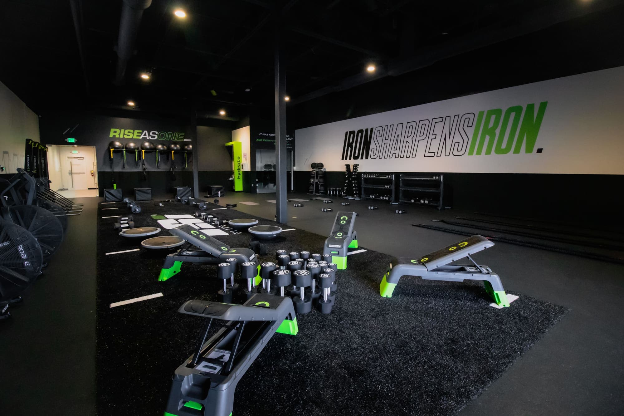 Benches, dumbbells, and training equipment on the ISI Elite Training floor