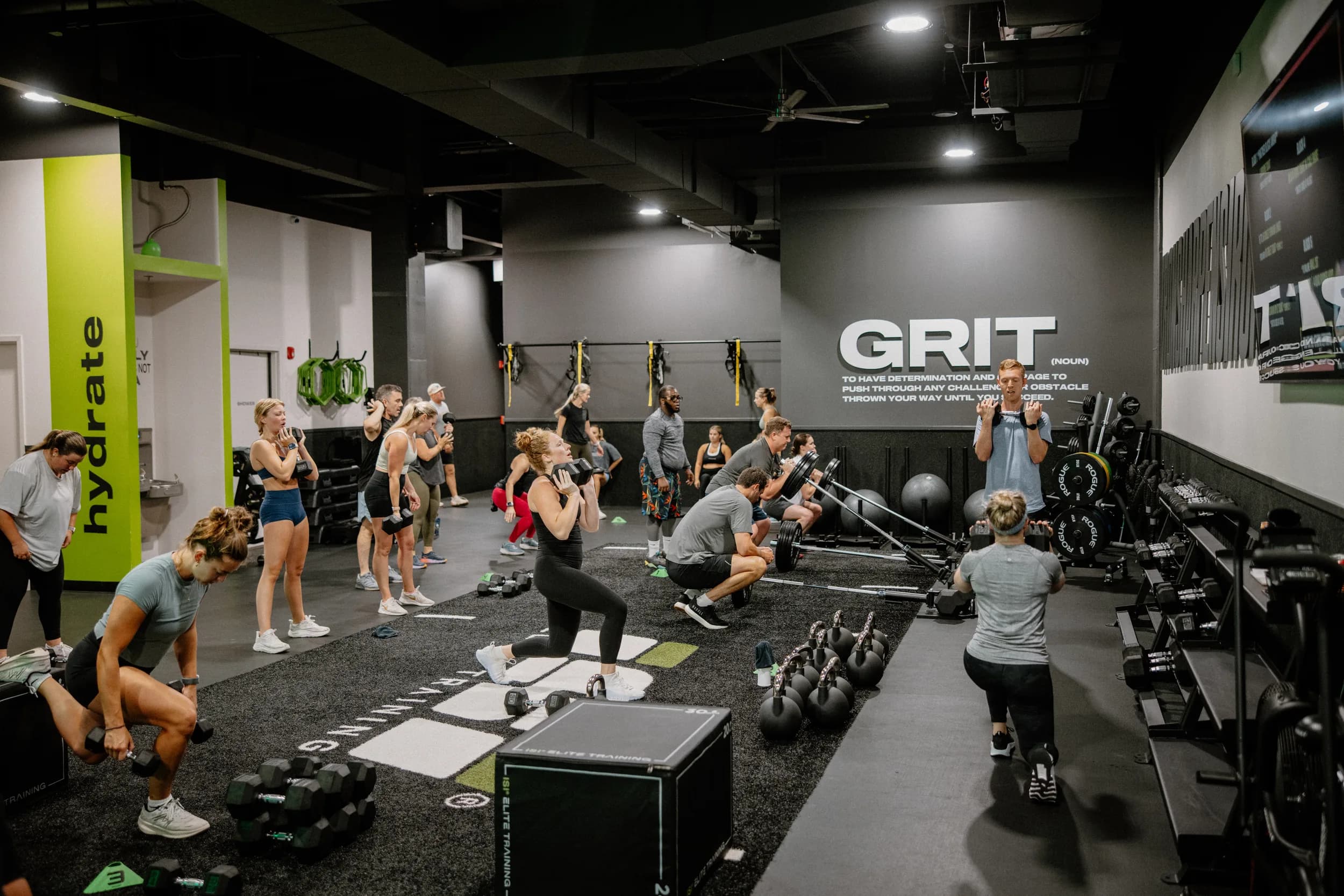 Members training together on the ISI gym floor